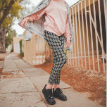 White Dahlia Floral Pattern on Black Leggings<br><div class="desc">Stretchy,  fashionable leggings that feature the photo image of a simple,  white Dahlia flower with yellow centre on a black background and printed in a repeating pattern. A fun,  floral design! Select your leggings size.</div>