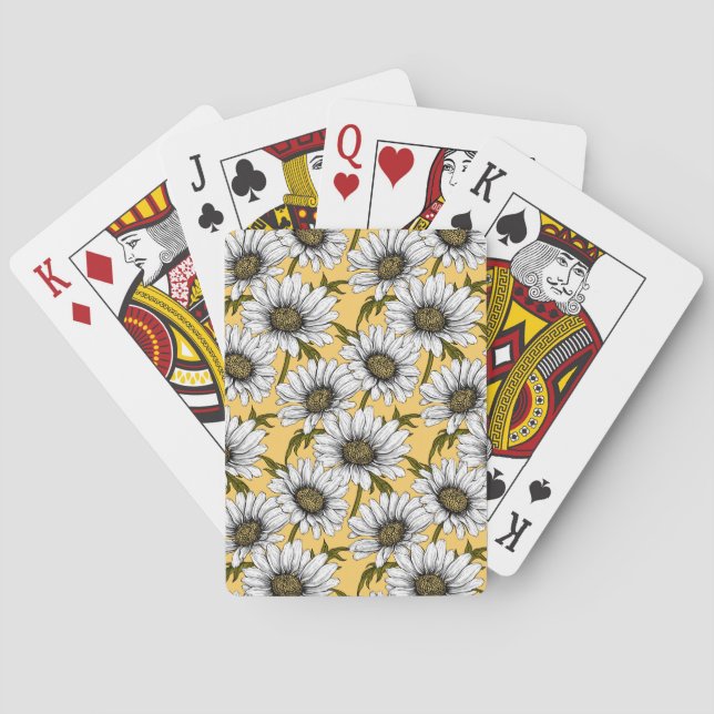 White daisies, wild flowers on yellow playing cards (Back)