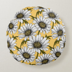 White daisies, wild flowers on yellow round cushion
