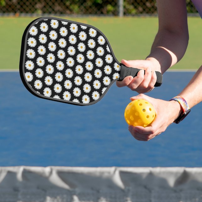 White Daisy Floral Pattern on Black Pickleball Paddle (Insitu)