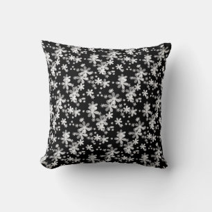White daisy flowers on black background cushion