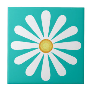 White daisy, yellow centre, on cyan tile