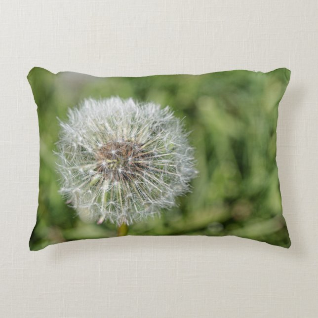 White dandelion flower on green grass decorative cushion (Front)