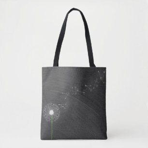 white dandelion on chalkboard background tote bag