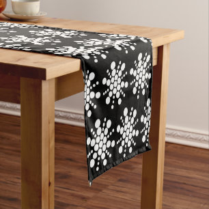 White dotted stars on black short table runner