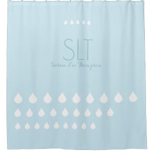 white drops with monogram on pale blue shower curtain