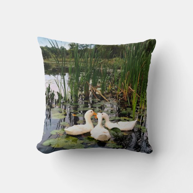 White ducks, lily pads, cattails, lake shore cushion (Front)