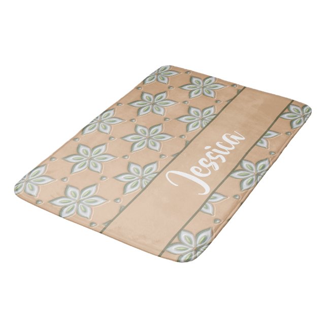 White engraved flowers on tan bath mat (Angled)