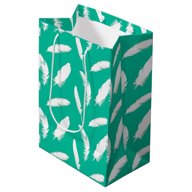 White feather print on turquoise medium gift bag (Front Angled)