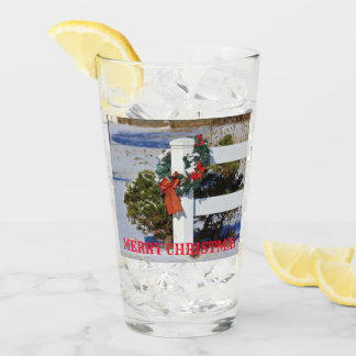 White Fence with Snow and a Red Bow Glass Cup
