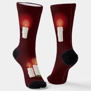White Festive Christmas Candles On Red Socks