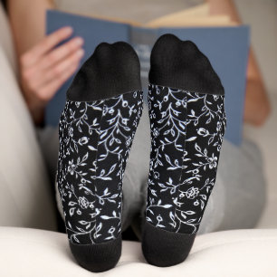 White floral design on black socks