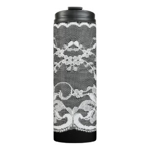 White floral lace: black background. thermal tumbler
