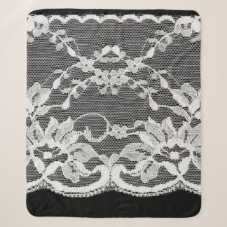 White floral lace on a black background. sherpa blanket