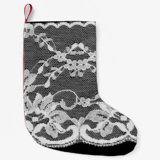 White floral lace on a black background. small christmas stocking