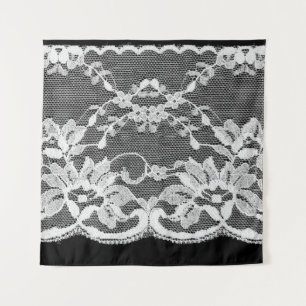 White floral lace on a black background. tapestry