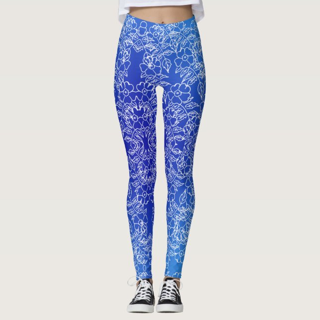 White Floral pattern print on Blue Leggings (Front)
