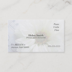 white flower on music business card