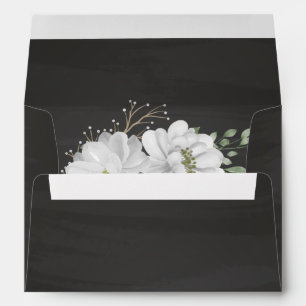 white flowers greenery black wedding envelope