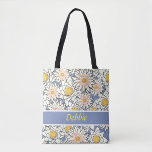 White flowers on blue tote bag