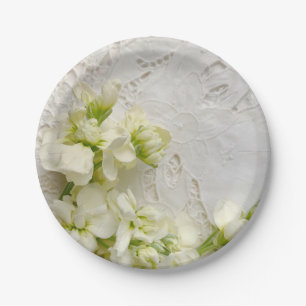White flowers on old lace paper plate