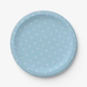 White flowers on soft blue plate