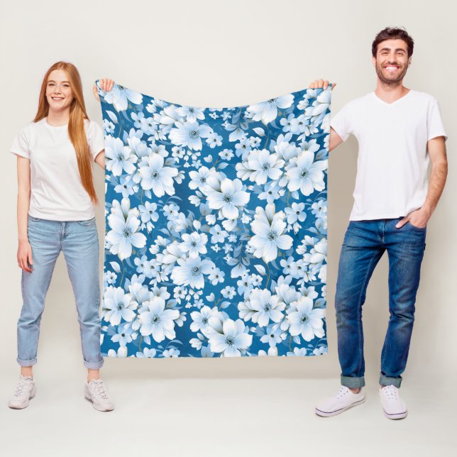 white flowers pattern, blue background, fleece blanket (In Situ)