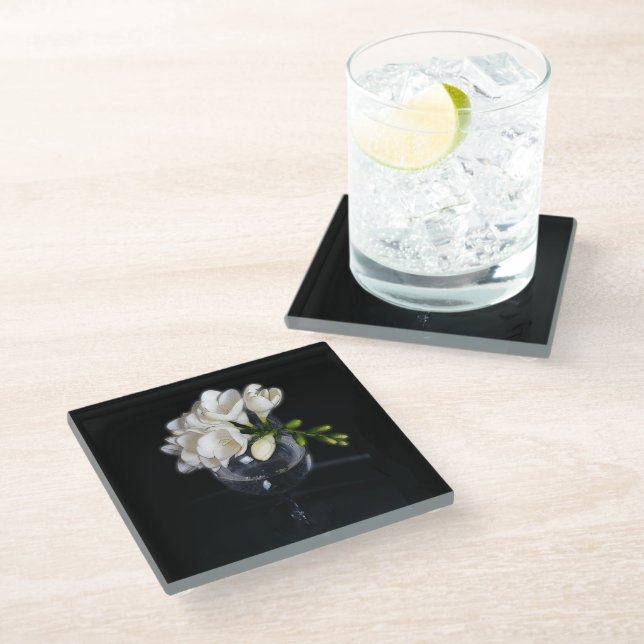 white freesia in a glass coaster (Angled)
