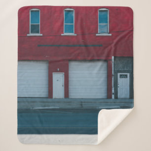 WHITE GARAGE DOORS CLOSED DURING DAYTIME SHERPA BLANKET