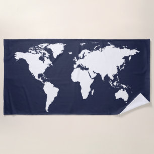 white graphic map of world on deep blue beach towel