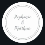 White & Grey Minimalist Wedding Bride Groom Favour Classic Round Sticker<br><div class="desc">Simple, minimalist and chic Wedding design features bride & groom's names in a modern design with a double framed border in Ultimate Grey on a chic crisp white background. The modern design is simple and chic. Personalise wedding details with your names in trendy grey script. Be sure to see the...</div>