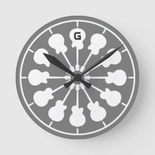 white guitars . guitar player round clock