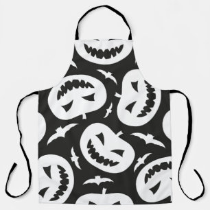 White halloween pumpkins and bats isolated on blac apron