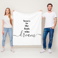 White Here’s to Fools Who Dream Black Typography