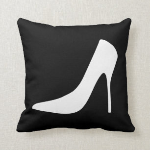 WHITE HIGH HEEL SHOES ON BLACK BACKGROUND CUSHION