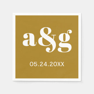 White initials typography on golden brown wedding napkin