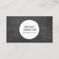 White Ink Blot Circle Logo on Black Chalkboard