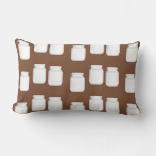 White jars on brown lumbar cushion