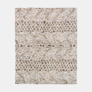 White knitting wool texture background. fleece blanket