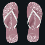 White Lace on Dusty Rose Bridesmaid Wedding Jandals<br><div class="desc">These beautiful wedding flip flops are a great way to thank and recognise your bridesmaids while saving their feet at the same time. Features a simple yet elegant design with white floral lace filigree on a dusty rose or mauve pink coloured background. The elegant script lettering reads Bridesmaid with her...</div>