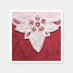 White lace on red fabric napkin