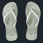 White Lace on Sage Green Bridesmaid Wedding Jandals<br><div class="desc">These beautiful wedding flip flops are a great way to thank and recognise your bridesmaids while saving their feet at the same time. Features an elegant design with white floral lace filigree on a dusty purple, lilac, or lavender coloured background. The elegant script lettering reads Bridesmaid with her name below....</div>