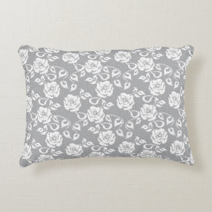 White lace pattern on grey background decorative cushion