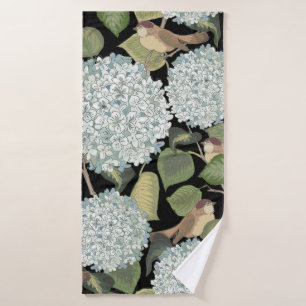 White, light blue Hortensia with green leaves and Bath Towel