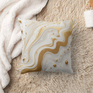 White liquid and with drops and golden glitter cushion