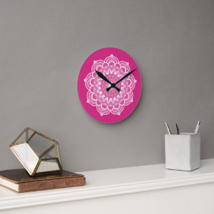 White Mandala on Pink Background Round Clock
