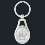 White Marble Modern Script Personalised Groomsmen Key Ring<br><div class="desc">Add a personal touch to your wedding with personalised groomsmen keychain. This keychain features personalised groomsmen's name in grey modern script font style and monogram in light grey modern script font style as background with title and wedding date in grey modern sans serif font style on white marble background. Also...</div>