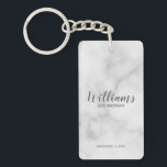White Marble Modern Script Personalised Groomsmen Key Ring<br><div class="desc">Modern Script Personalised Groomsmen Keychain featuring personalised groomsman's name in grey modern script font style with title and wedding date in modern sans serif font style on white marble background. Also perfect for Maid of Honour, Flower Girl, Mother of the Bride, Groomsmen, Best man and more. Please note: The marble...</div>