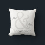 White Mr. and Mrs. Couple's Cushion<br><div class="desc">For the Mr. and Mrs., this Couple's pillow features an oversized ampersand with the couple's last name that you can personalise with your name. Shown here in white with matching grey and white stripes on the reverse side. You can change the stripes colour on by choosing the "customise it" button...</div>