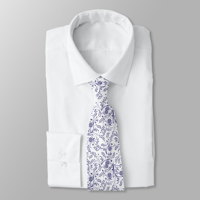 White neck tie with elegant blue floral pattern  (Creator Uploaded)